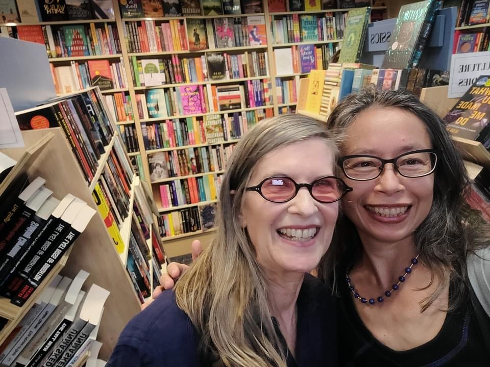 Author Anne Howell and artist Mai Nguyen-Long at Collins Books THirroul at the first launch of Howell's memoir, All That I Forgot.